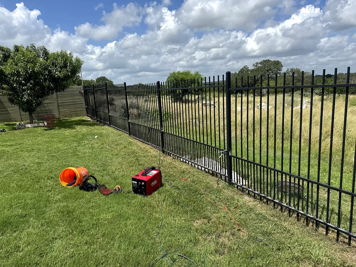 Steel picket fence built by JT Custom Fab